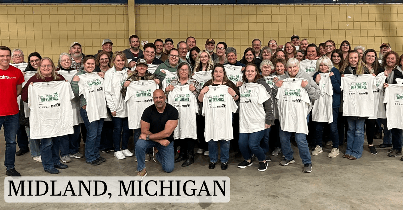 Midland, Michigan group smiling at You Make The Difference event