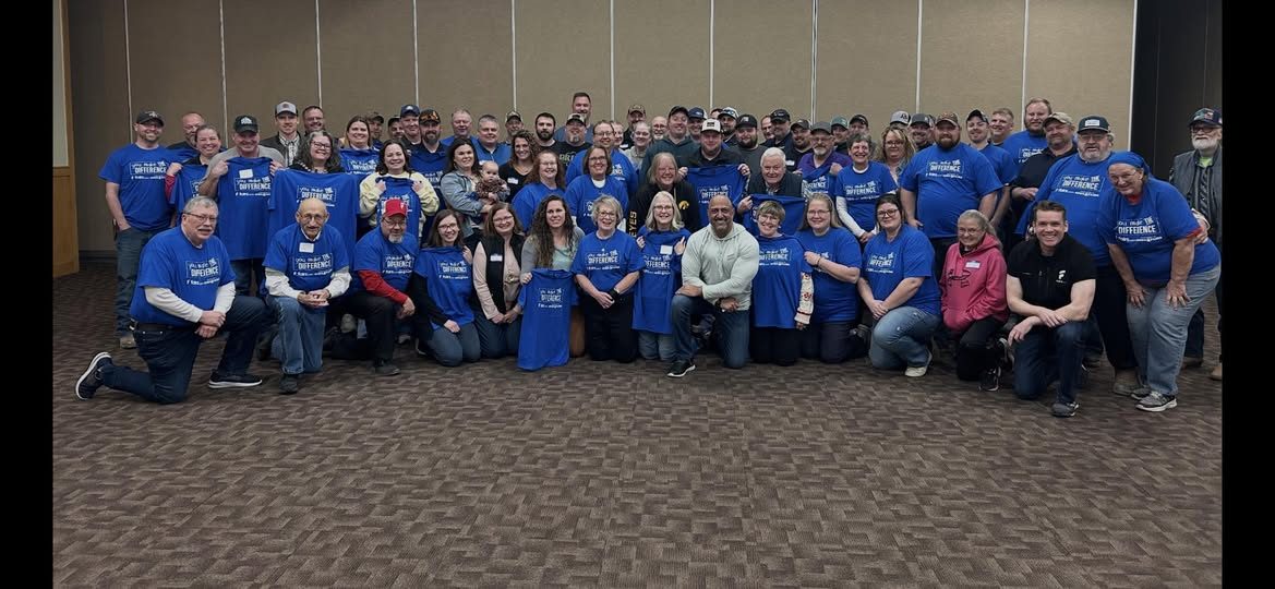 Participants gather for a group photograph with YMTD Initiative in Atlantic Iowa.