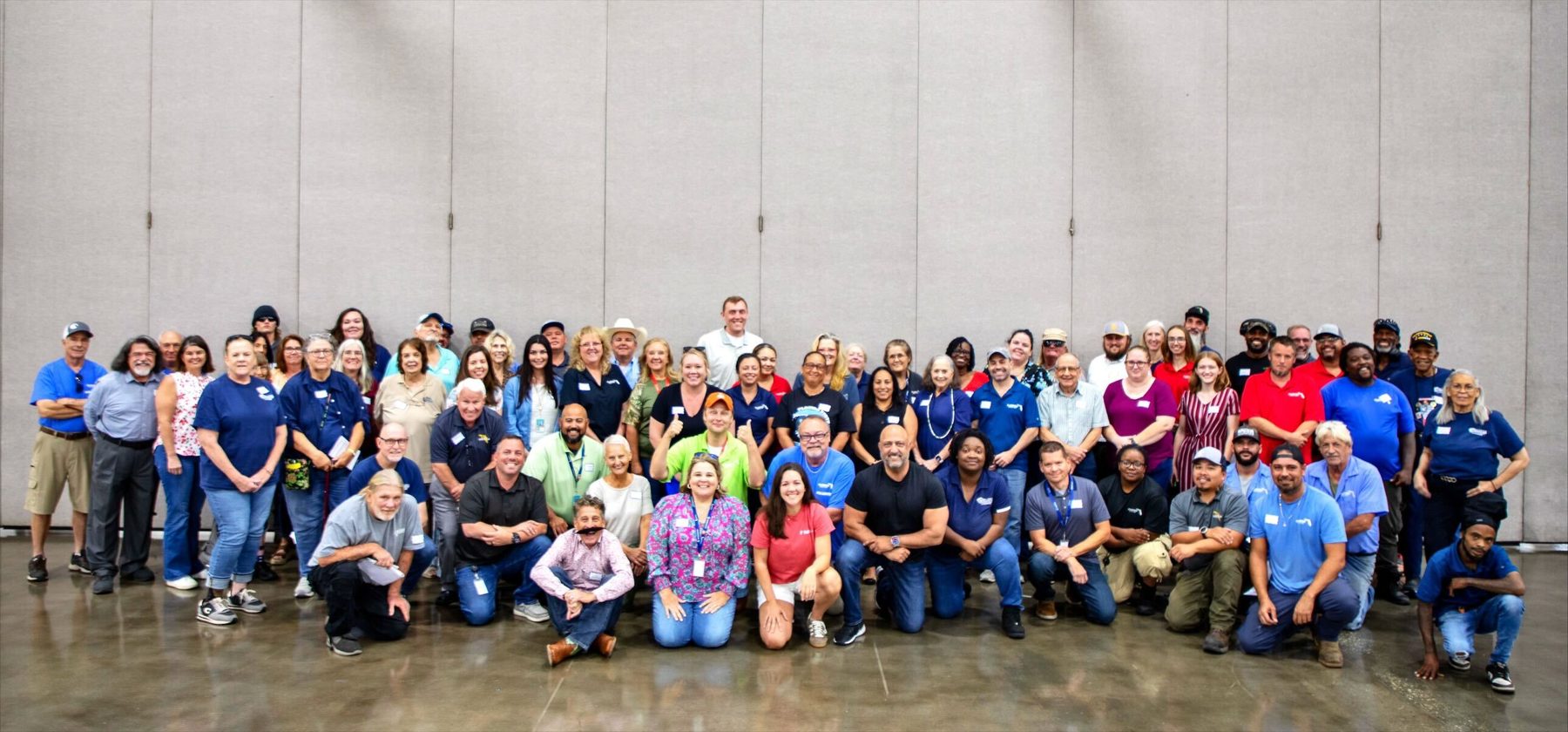 Participants gather for a group photograph with YMTD Initiative in Tampa Florida State Fair.